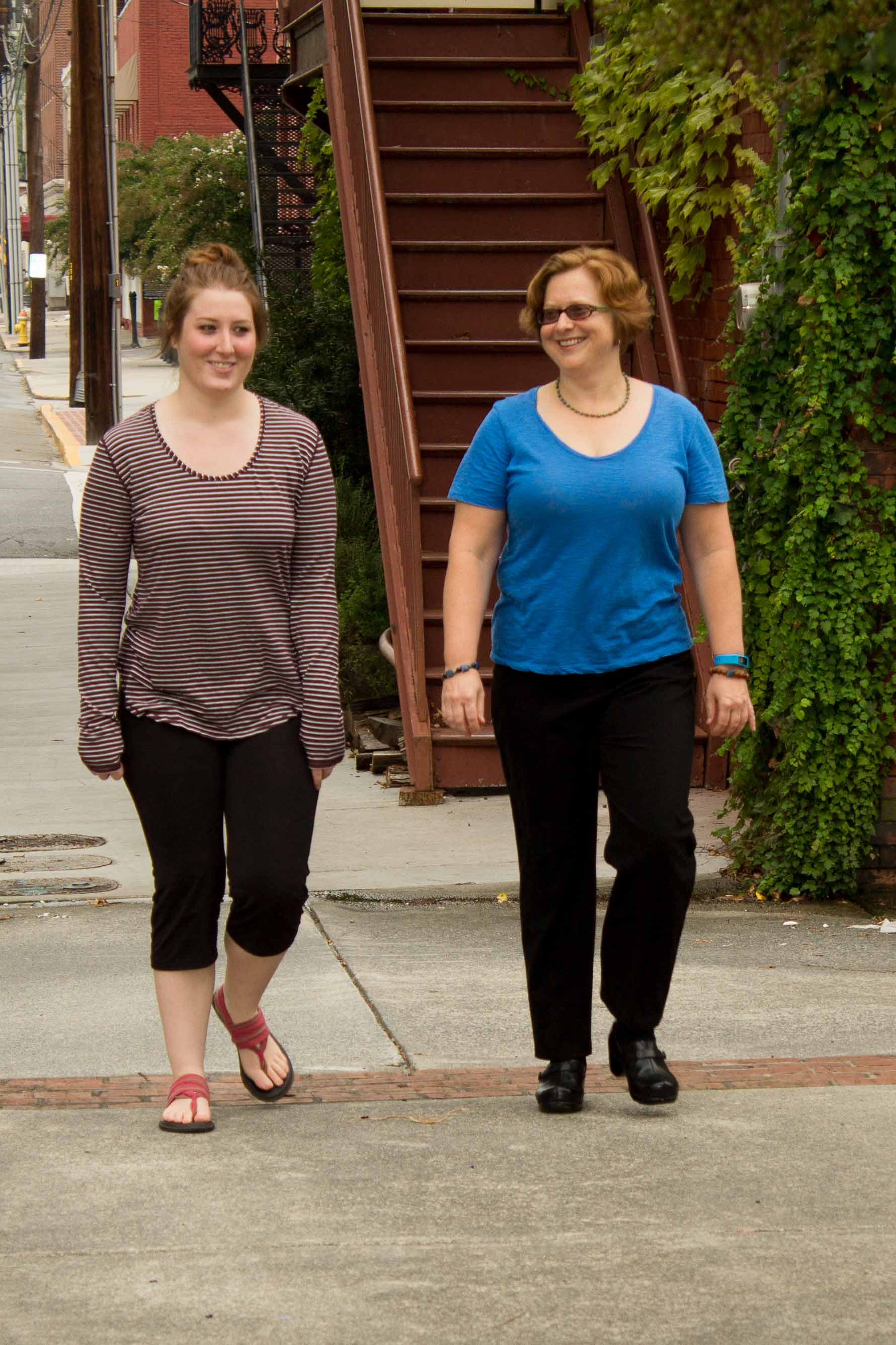 Ellen Thompson and client walking during a counseling session